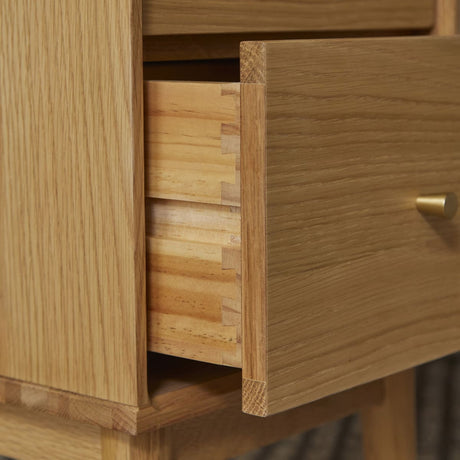 Fishe and Lilly Bedside Table featuring a smooth wooden finish with spacious drawers