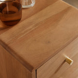 Fishe and Lilly Bedside Table in natural wood finish featuring a sleek design and a glass of water on top
