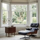 Fishe and Lilly bedside table with storage, positioned by a modern armchair and window in a stylish interior