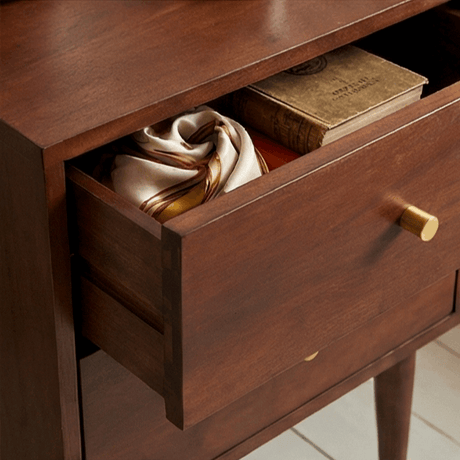 Fishe and Lilly Bedside Table with a drawer open, showcasing storage for books and accessories