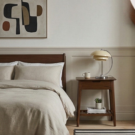 Fishe and Lilly bedside table in a cozy bedroom setting with lamp and decorative items