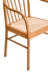Orsina Beech Wood Chair with a woven seat and elegant, curved armrest design