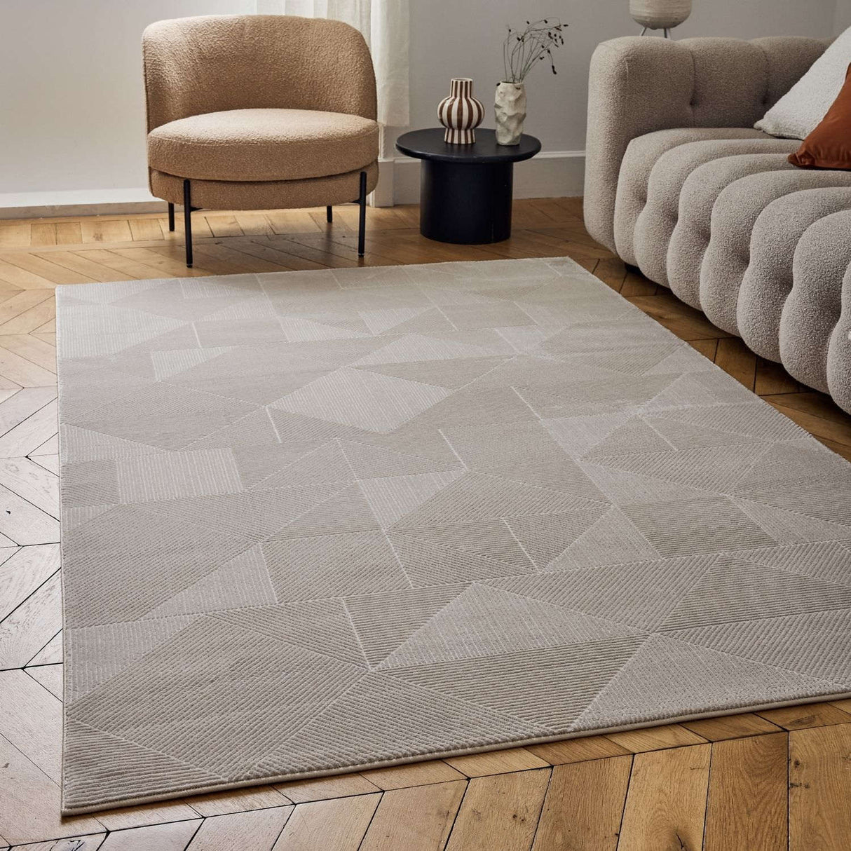 Contemporary beige rug with geometric patterns, perfect for modern living rooms