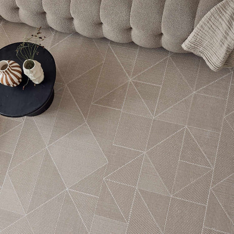 Stylish beige rug featuring a geometric pattern, perfect for enhancing contemporary living spaces