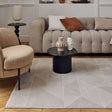 Beige Rug with Geometric Patterns in a Modern Living Room Setting