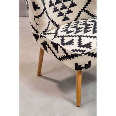 Orsina Berber Style Chair with distinctive geometric patterns and wooden legs for modern interiors