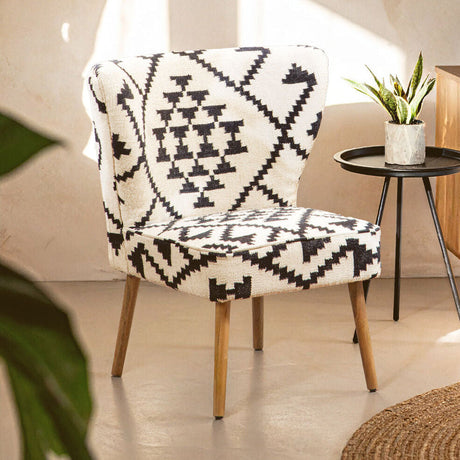 Orsina Berber Style Chair with black and white geometric pattern and wooden legs, perfect for stylish interiors