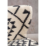 Close-up of Orsina Berber Style Chair featuring intricate tribal patterns in black and cream