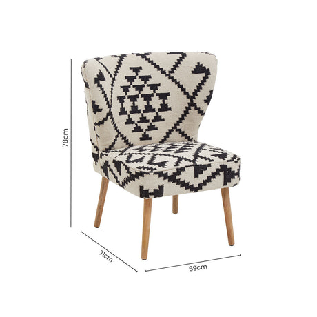 Orsina Berber Style Chair with geometric pattern and wooden legs, perfect for accenting any room