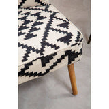 Close-up of an Orsina Berber Style Chair featuring a geometric black and cream patterned upholstery