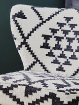 Orsina Berber Style Chair featuring a geometric pattern in black and white for modern interiors