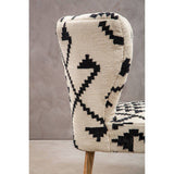 Orsina Berber Style Chair with a unique black and white geometric pattern and wooden legs