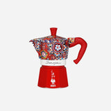 Bialetti Moka Express in vibrant red and patterned design for making traditional espresso coffee