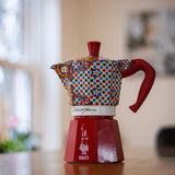 Bialetti Moka Express coffee maker in vibrant patterned design for brewing rich espresso