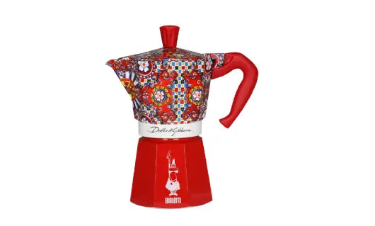 Bialetti Moka Express in vibrant red with decorative floral patterns for traditional coffee brewing