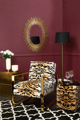 Stylish Black and White Rug under a bold lounge chair in a modern living room setting
