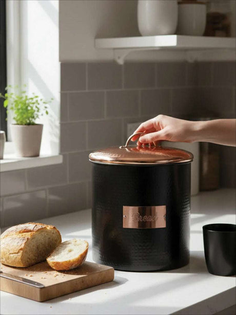 Orsina Bread Bin with a copper lid for stylish storage of fresh bread on kitchen countertop