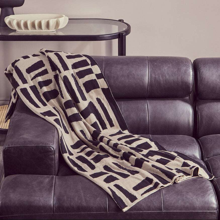 Chic Orsina Black Throw with Abstract Pattern Perfect for Cozy Living Room Decor