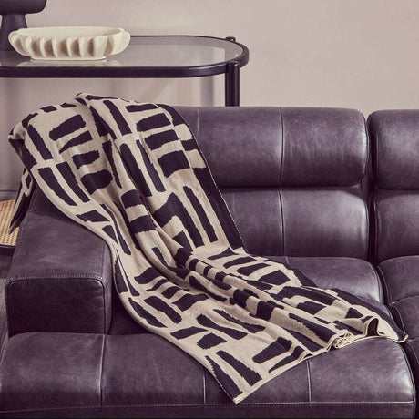 Chic Orsina Black Throw with Abstract Pattern Perfect for Cozy Living Room Decor