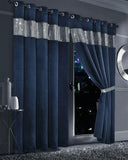 Elegant navy blackout curtains with silver detailing, perfect for light control and privacy