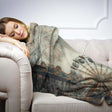 Cozy HOME ART HAVEN blanket featuring a vintage amusement park design, perfect for lounging on the sofa