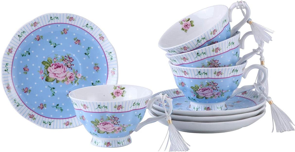 Set of elegant floral tea cups in blue with matching saucers, perfect for afternoon tea