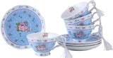 Set of elegant floral tea cups in blue with matching saucers, perfect for afternoon tea