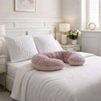 BellaMoon Body Pillow in Pink with a Unique Shape for Comfort and Support on the Bed