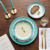 KitchBoom Bone China Dinner Set with Elegant Turquoise Design and Gold Accents on a Wooden Table
