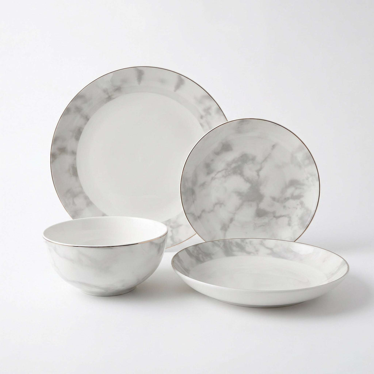 Elegant Bone China Dinner Set with Marble Design, including plates and bowls for stylish dining