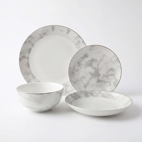 Elegant Bone China Dinner Set with Marble Design, including plates and bowls for stylish dining