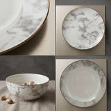 KitchBoom Bone China Dinner Set featuring elegant marble design with gold trim for stylish dining