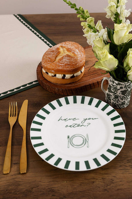 Avalon Home UK Bone China Plate featuring green striped rim with 'have you eaten'?