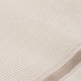 Soft textured Bordered Rug in neutral tones, perfect for enhancing any home decor