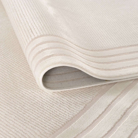 Soft beige Bordered Rug featuring elegant stripes, perfect for enhancing home decor