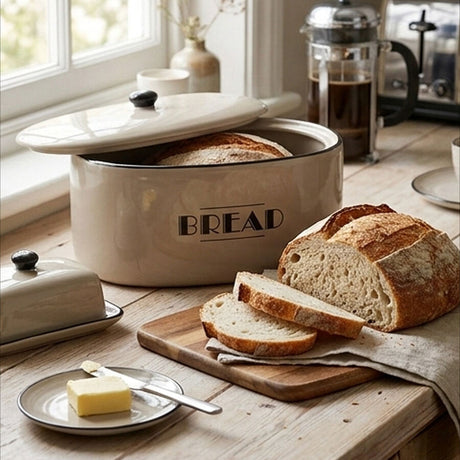 Orsina Bread Bin in Beige with Freshly Sliced Loaves and Butter on a Wooden Board