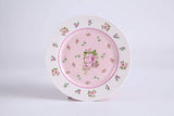 Elegant pink Cake Plate Set with floral design, perfect for serving desserts at special occasions