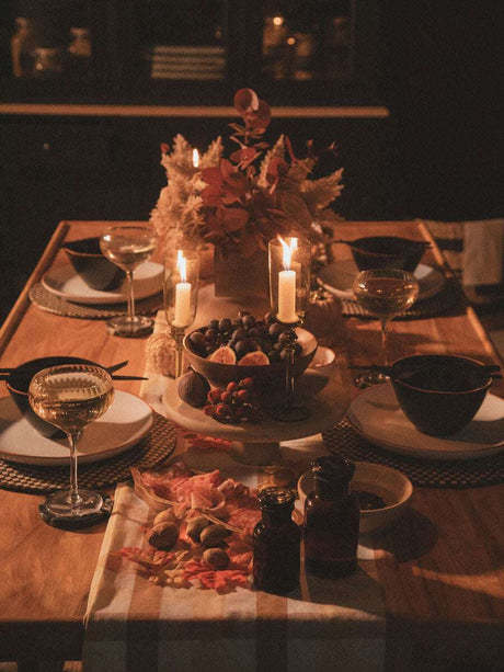 Elegant Orsina Cake Stand displaying a selection of fruits on a beautifully arranged dining table