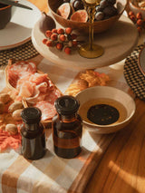Orsina Cake Stand elegantly displaying meats and fruits for a festive table setting