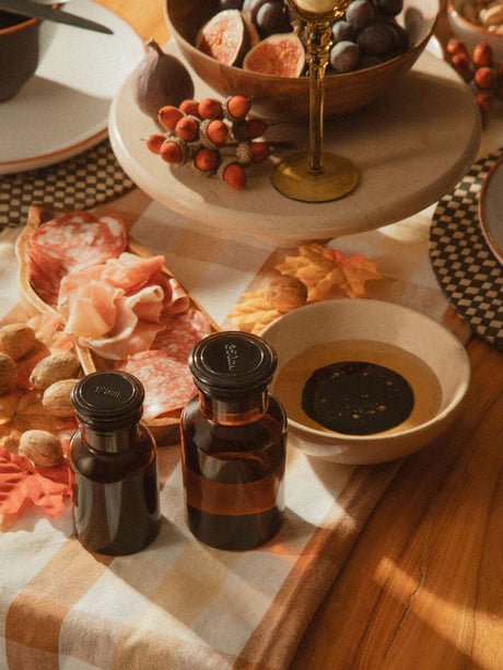 Orsina Cake Stand elegantly displaying meats and fruits for a festive table setting