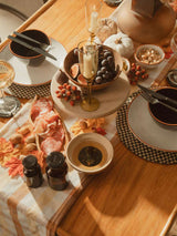 Elegant Orsina Cake Stand on a stylish dining table decorated with autumn elements and delicious treats