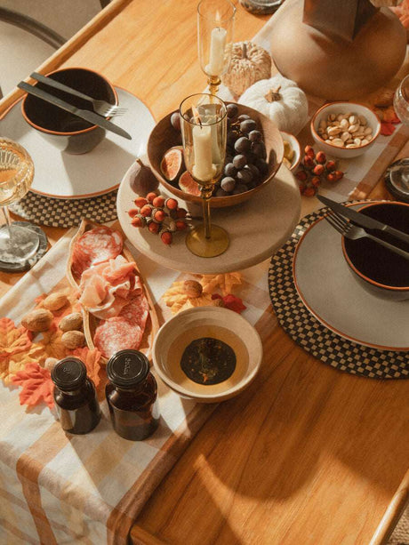 Elegant Orsina Cake Stand on a stylish dining table decorated with autumn elements and delicious treats