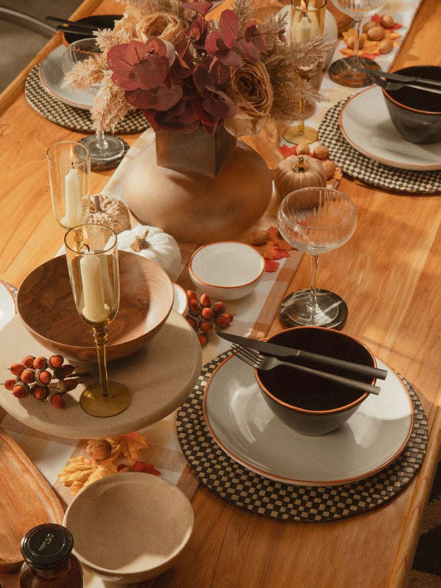 Stylish table setting featuring an Orsina Cake Stand with elegant dinnerware and autumn decor