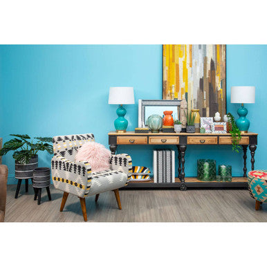 Stylish living room decor featuring an Orsina Candle Holder on a wooden console table