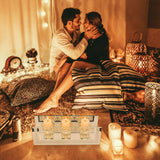 Elegant glass candle holder centrepiece with lit candles, setting a romantic atmosphere at home