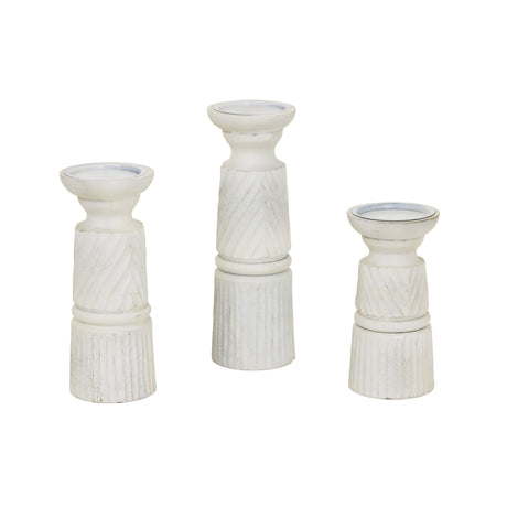 Set of three elegant white candle holders with textured designs for home decor