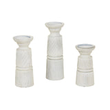 Set of three decorative white candle holders with textured designs for elegant home decor