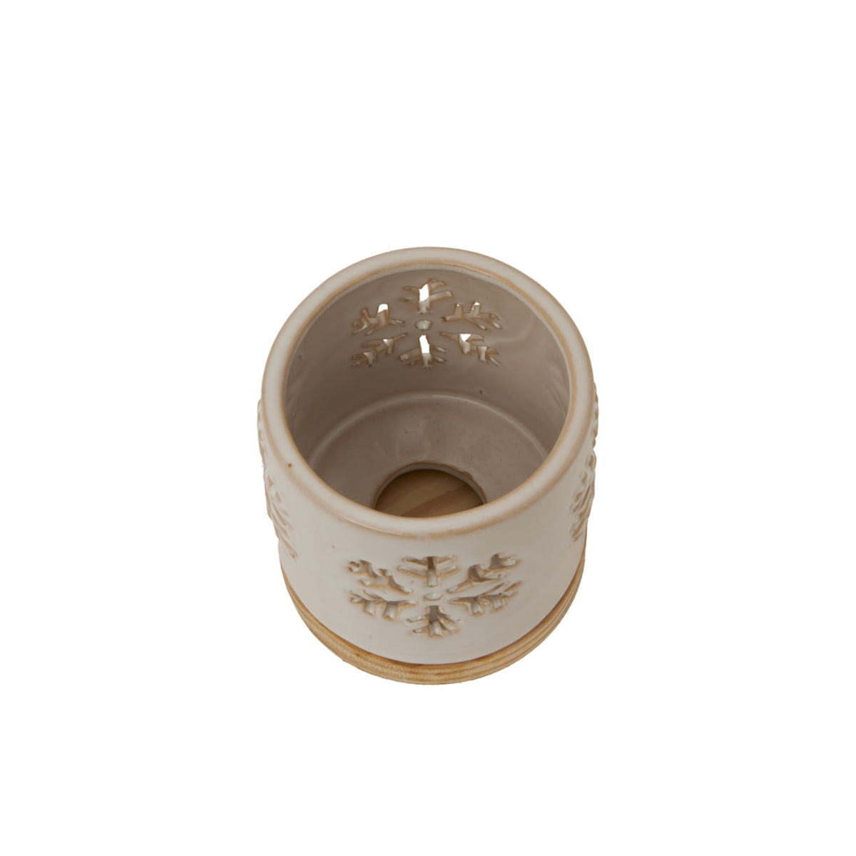 Decorative ceramic candle holder with snowflake design, perfect for Christmas decor