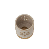 Decorative ceramic candle holder with snowflake design, perfect for Christmas decor