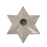 Star-shaped ceramic candle holder in neutral colour for festive Christmas decor